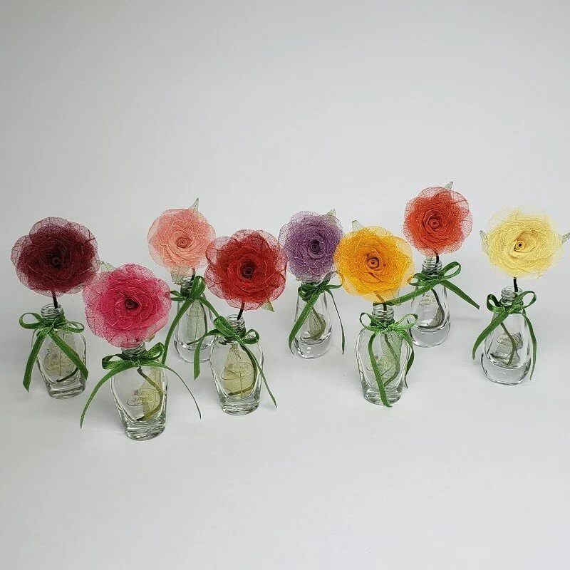 skeleton leaves mini flowers in vase.jpg