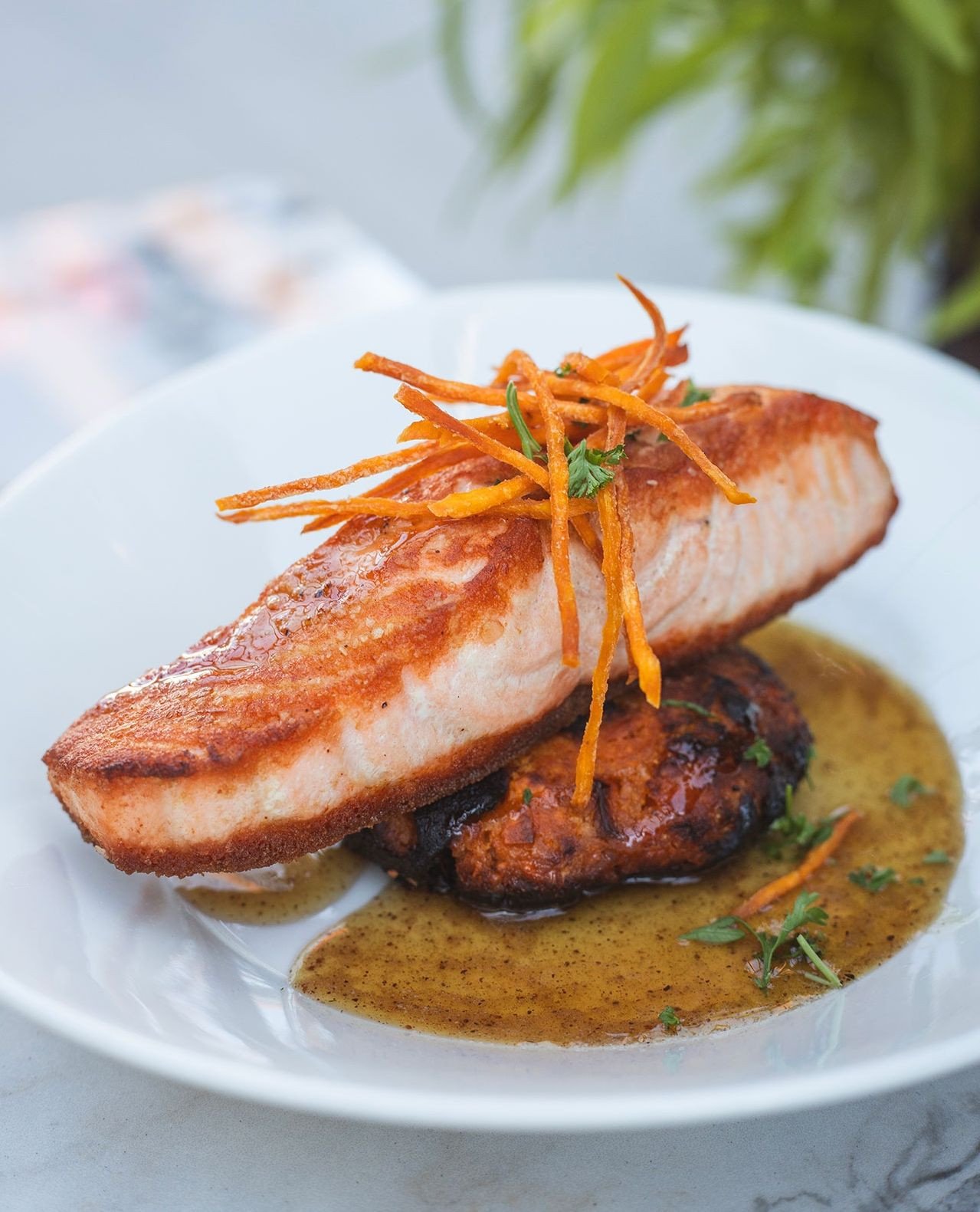 This month's seared salmon features a sweet potato apple cake, sherry maple glaze, and sweet potato hay. Available for a limited time only in Worcester and Wellesley!
