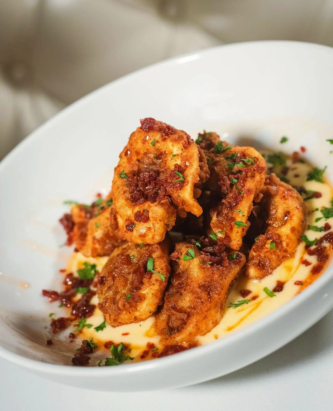 Fried Tortelloni with pretzel crust, cheddar fondue, tabasco honey, and bacon crumble. That's how you do a Monday.⁠
⁠
Available in Worcester for a limited time!