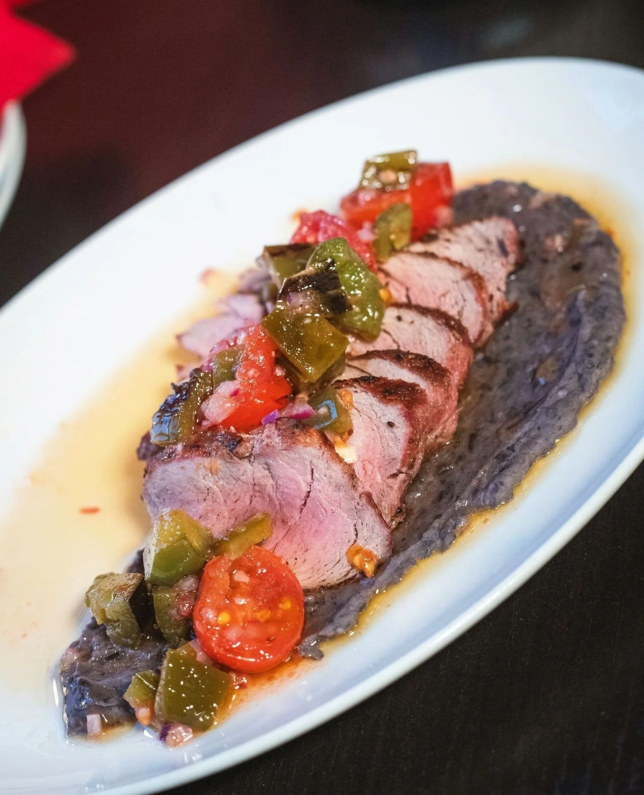 CAMPO GRANDE IBERICO PORK⁠
cumin rubbed imported Spanish pork tenderloin, black bean pur&eacute;e, blistered jalape&ntilde;o-cherry tomato sauce⁠
⁠
Limited time only in Worcester!