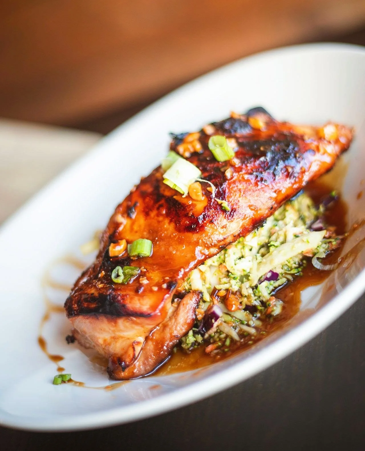 At Bocado, bold flavor is always on the menu 🔥⁠
⁠
Our SPICY CASHEW CHICKEN brings the heat and the sweet &mdash; marinated in a spicy-sweet soy blend, finished with a sticky cashew glaze, and served over crisp broccoli slaw for the perfect crunch (W