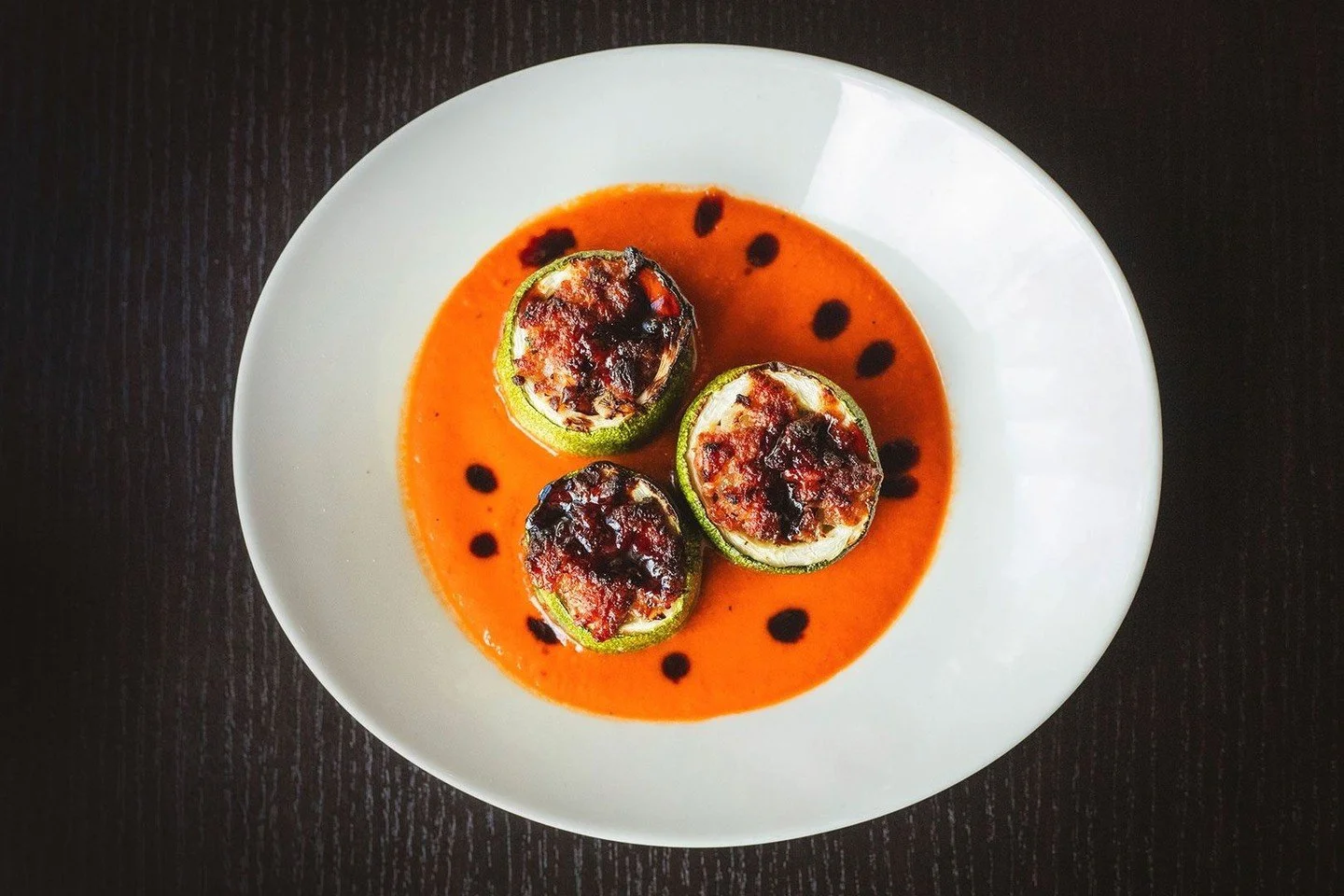 This month&rsquo;s specials are bringing the flavor.⁠
⁠
STUFFED ZUCCHINI &mdash; roasted and filled with Portuguese linguica and fontina cheese, layered over roasted red pepper sauce and finished with a touch of port wine molasses. Smoky, rich, and j
