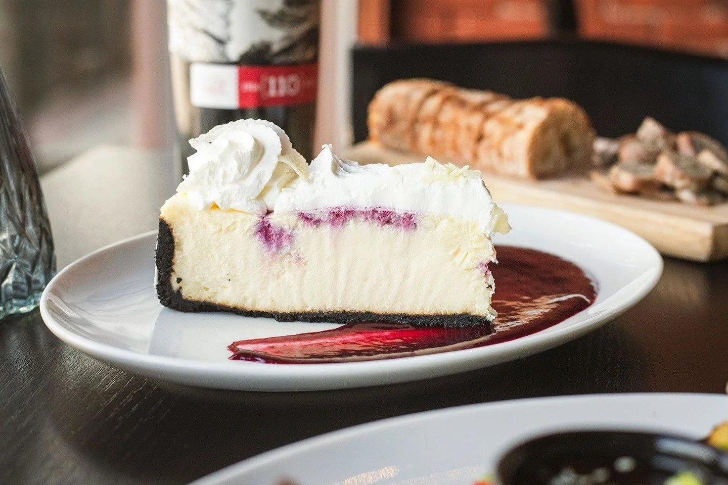 Our White Chocolate Raspberry Cheesecake layers rich, creamy white chocolate cheesecake with a bright blackberry coulis and a cloud of whipped cream for the perfect finish to your Bocado experience.⁠
⁠
Available this month in Worcester!