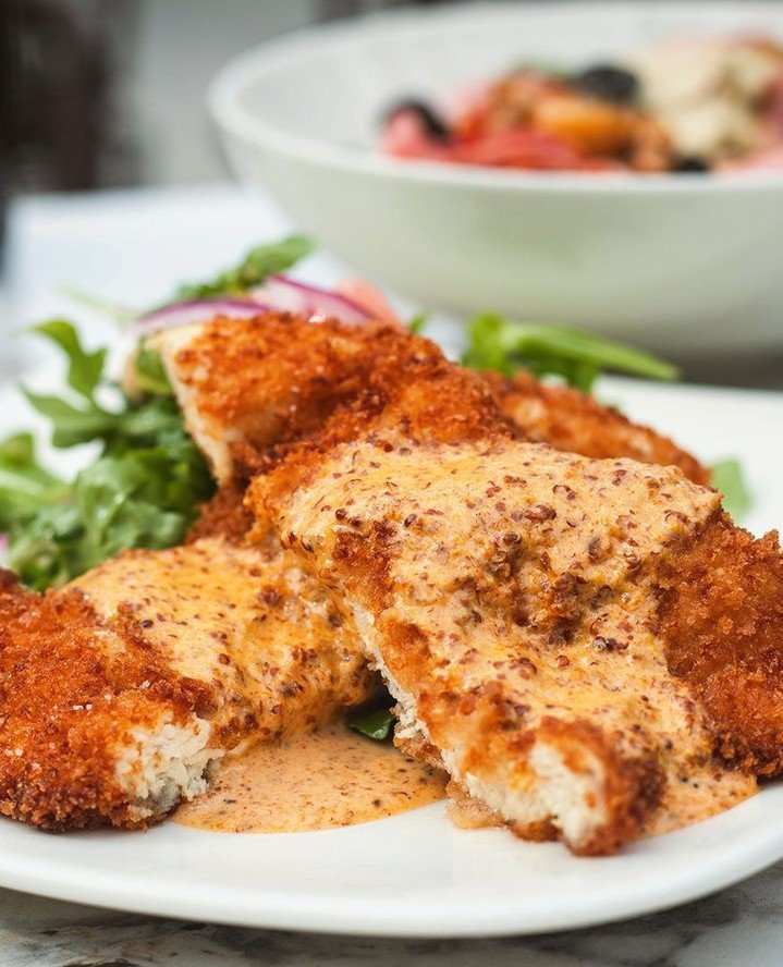 Golden, crispy, and packed with flavor.⁠
⁠
Our new Spanish Chicken Schnitzel features a panko-fried chicken cutlet served with an arugula &amp; chickpea salad and finished with a smoky piment&oacute;n grain mustard sauce. Available now as a monthly c