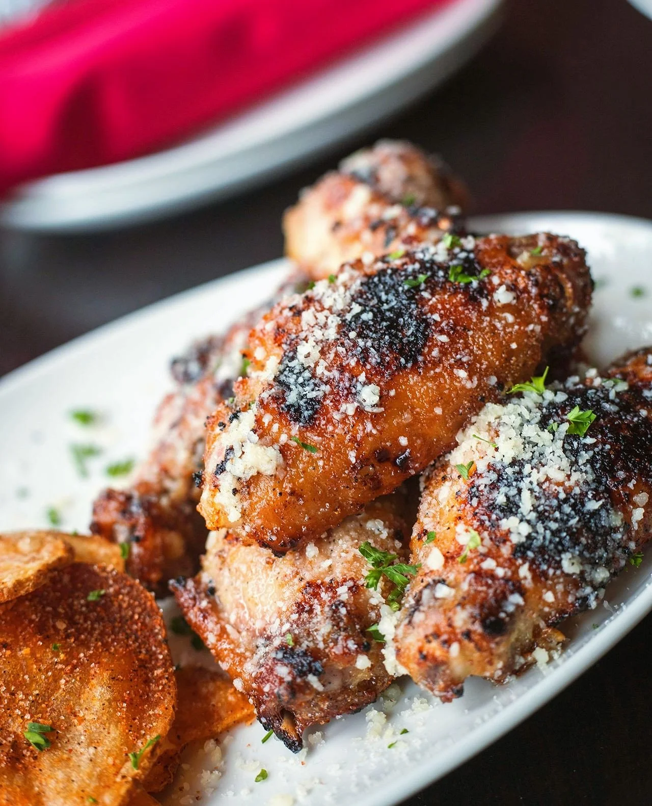 Our new Garlic Parmesan Chicken Wings are charcoal roasted, tossed in garlic butter and parmesan, and served with BBQ potato chips. ⁠
⁠
One of Chef&rsquo;s new monthly specials at Bocado&mdash;get them while they last!