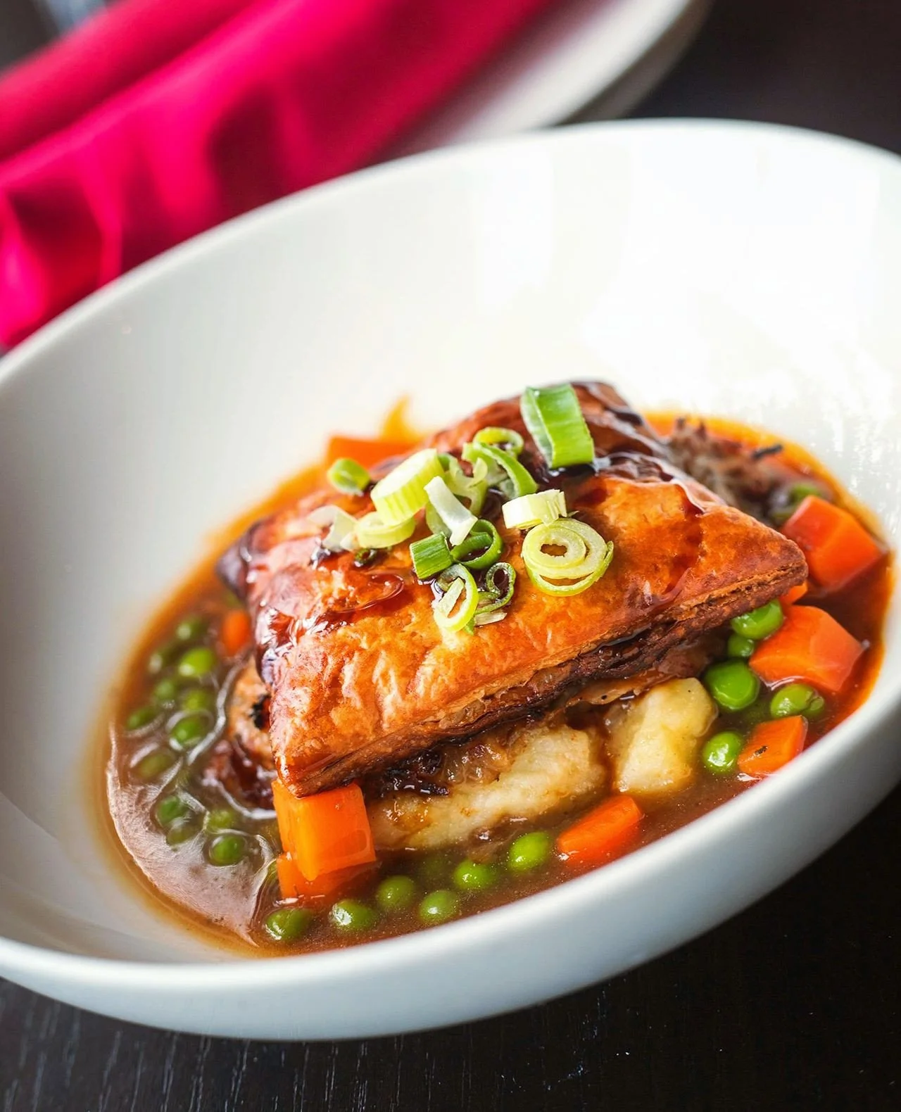 If you made it to our recent wine dinner, you'll certainly remember this beauty. And if you didn't, let us introduce you to the star of the show.⁠
⁠
Our Duck Tart layers tender duck confit, mashed potato, peas and carrots in flaky puff pastry, finish