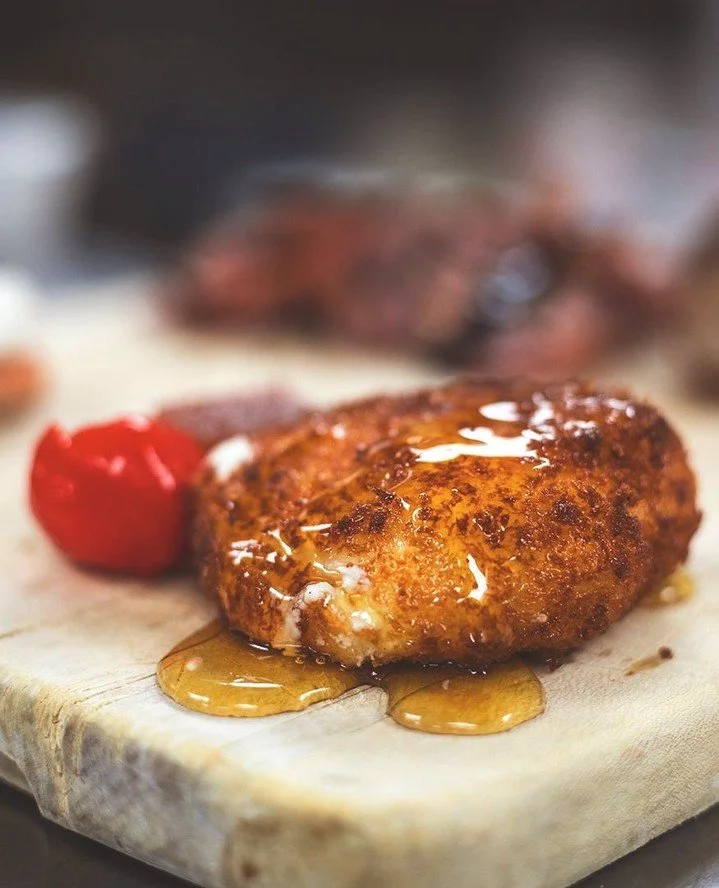 The experience doesn't officially start until the Fried Goat Cheese lands.⁠
⁠
Golden, crispy, creamy&mdash;and usually the first plate to disappear. There&rsquo;s a reason this Bocado staple has been part of so many nights around our tables.