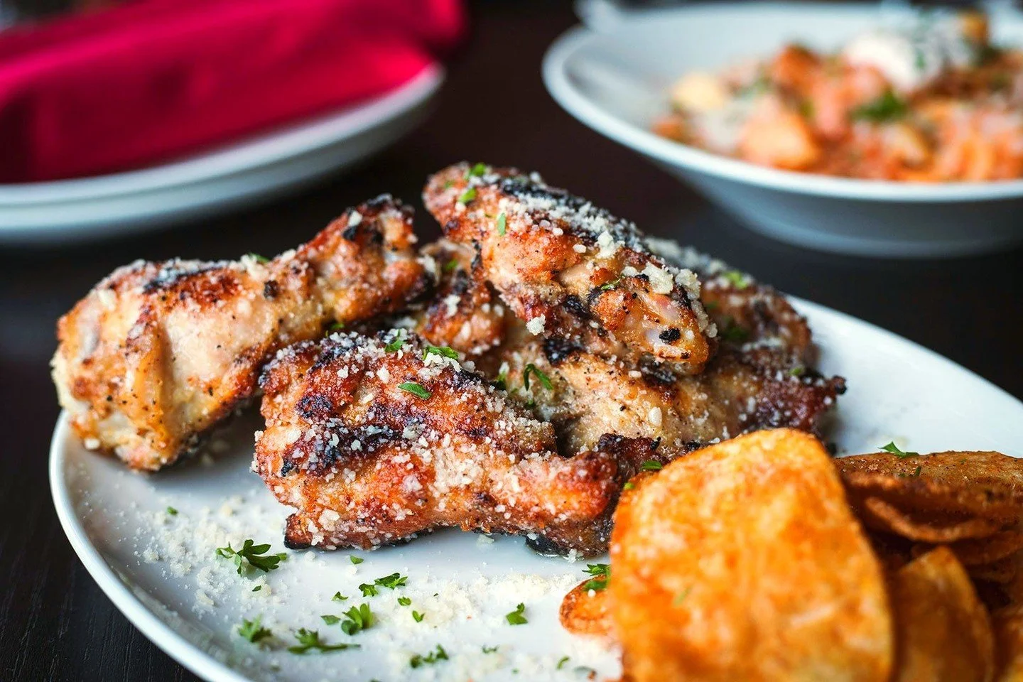 Labor Day weekend: less work, more wings.⁠
⁠
Our Garlic Parmesan Chicken Wings are charcoal roasted, tossed in garlic butter and parmesan, and paired with BBQ potato chips.⁠
⁠
We can&rsquo;t think of a better way to clock out of summer.