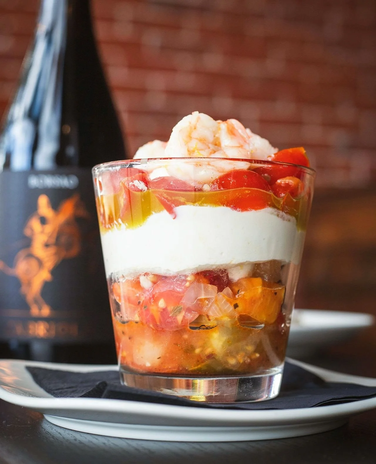 Some wine dinner dishes deserve a second act 🍅⁠
⁠
Our TOMATO PARFAIT was one of the night's highlights, so we're bringing it back as a chef special: slow roasted heirloom tomatoes, whipped goat cheese, cherry tomato concasse, lemon herb oil &amp; pi