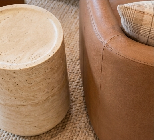 c_travertine_endtable_with_leather_chair.png
