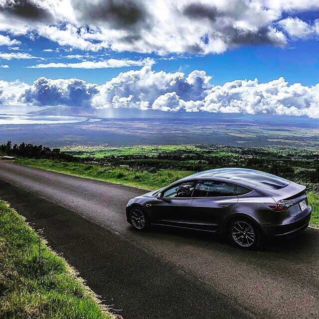 Tesla Model 3 looking clean on the Poli Poli of Maui, Hawaii. Wrapped in-house with 3M  Metallic Satin Dark Gray. #3mfilm #paintisdead #vinylwrap #maui #manavisual ✨🌴✨