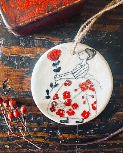 lady with red flower.jpg