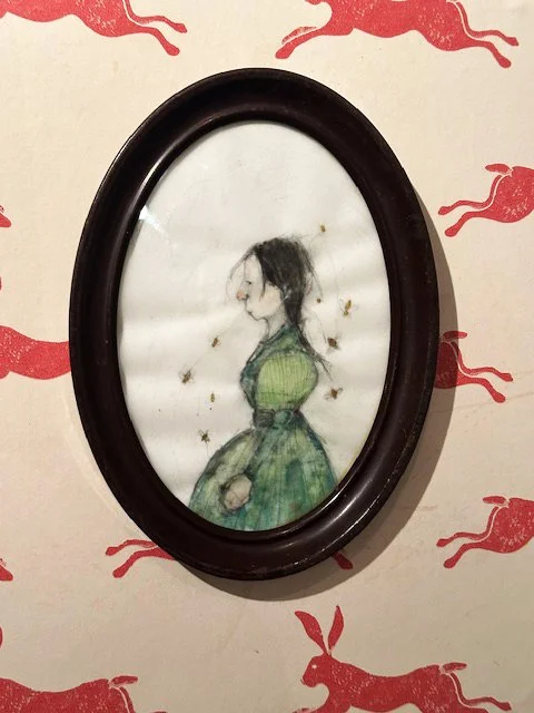 portrait of girl in green with bees framed.jpeg