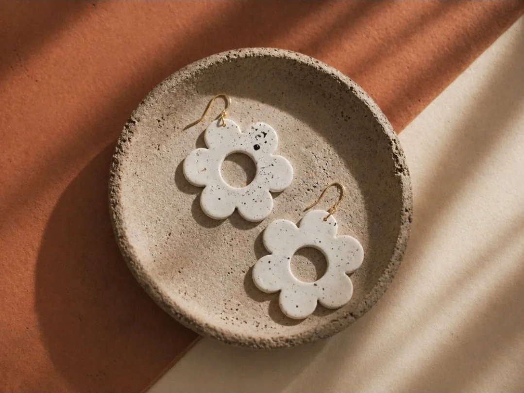 Large white speckled daisy polymer clay earrings on gold-filled hook, 2 inches, handmade by Akay Collective