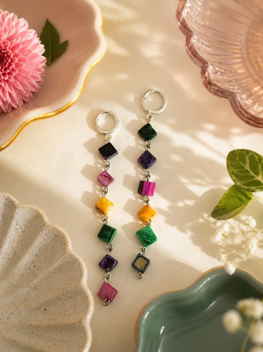 Long hand beaded rainbow square bead drop earrings on silver-plated huggie, multicolor teal magenta purple yellow, by Akay Collective