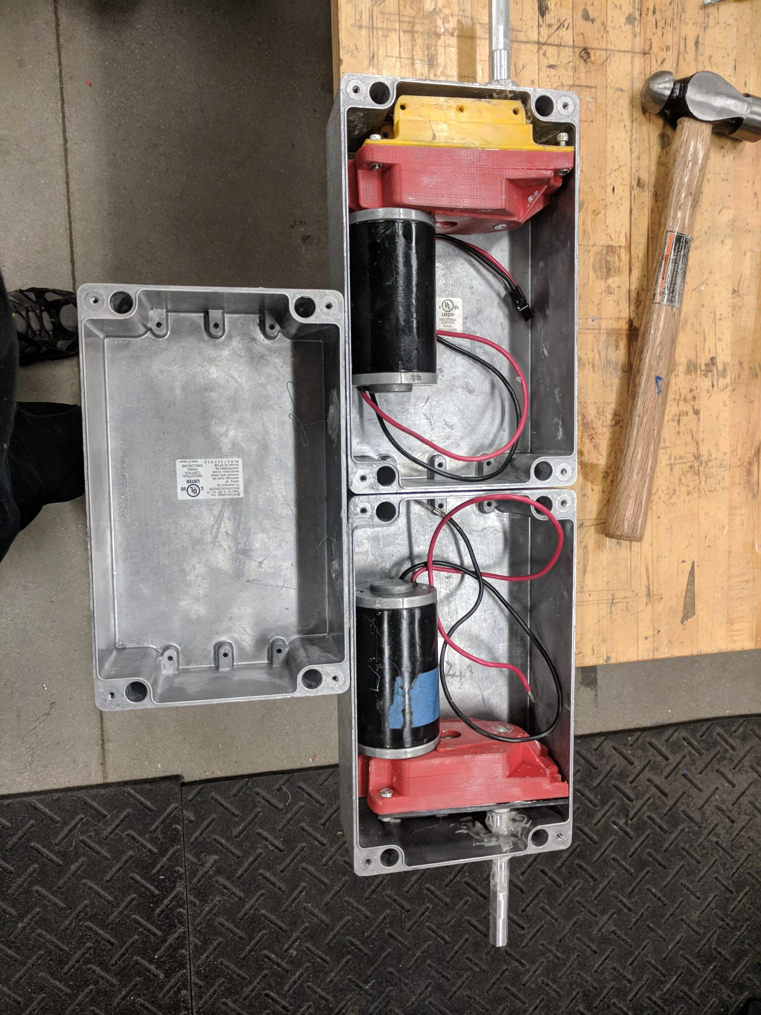 Enclosures fitted with both motor assemblies.