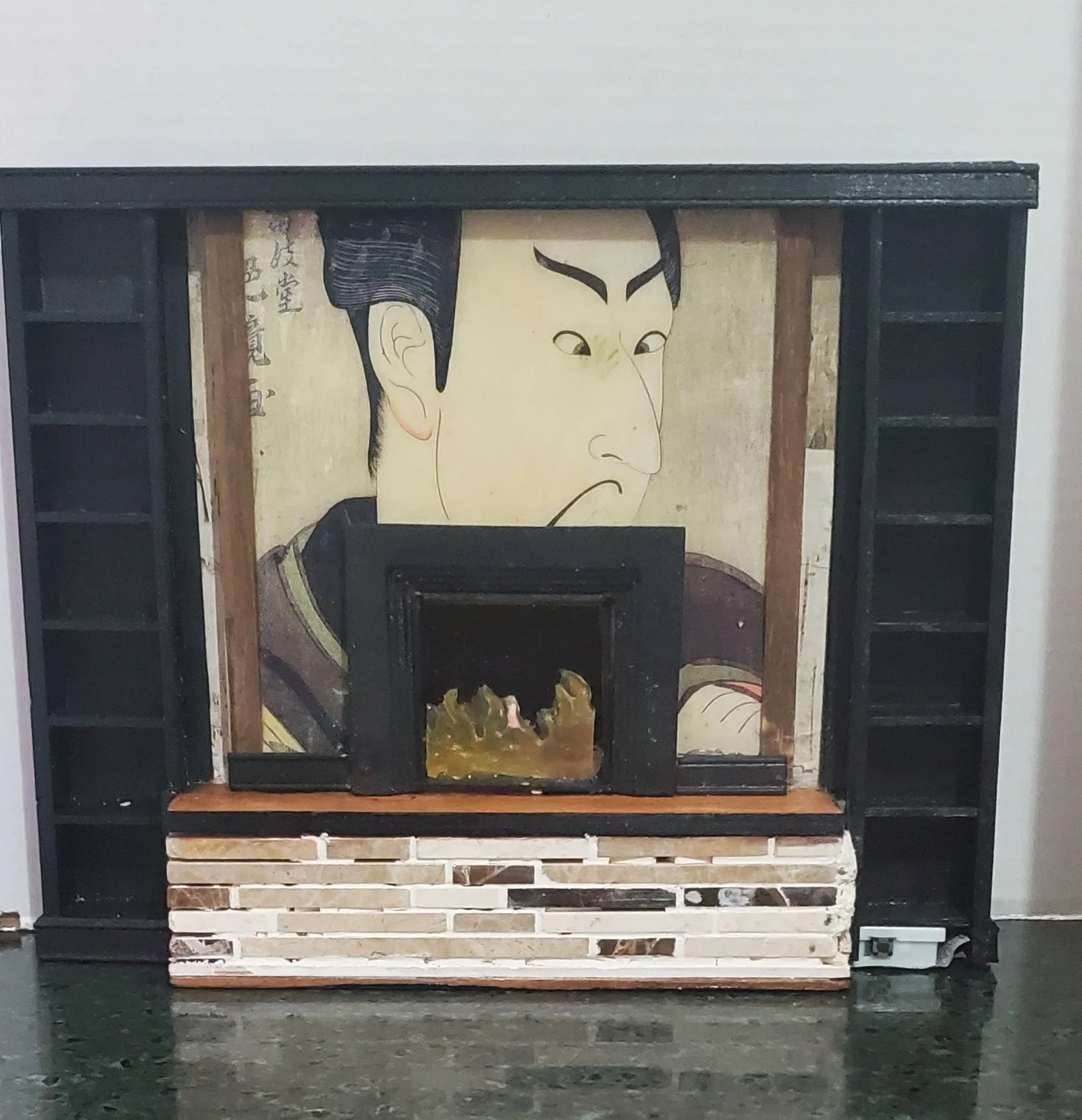 wall fireplace with bookends