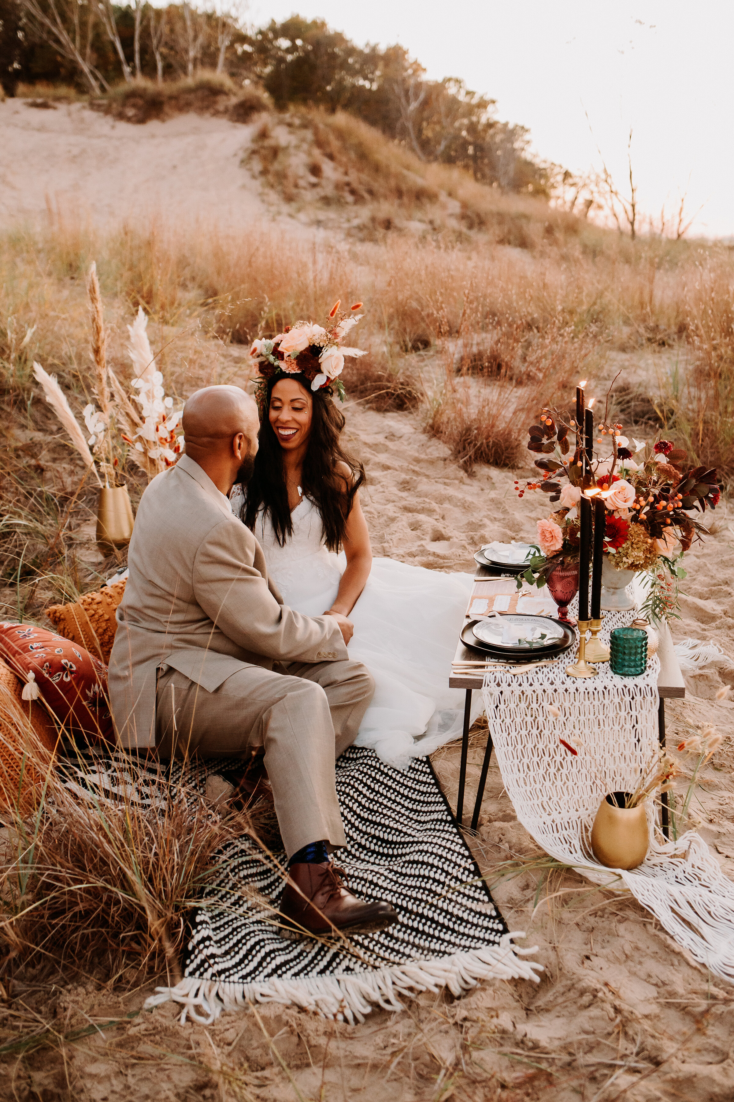  Take a peek at our bohemian-styled beach shoot on the shores of Lake Michigan near Chesterton, Indiana with adventurous boho themes like the floral headpiece this bride is wearing. midwest wedding boho vibes professional wedding photography beach el
