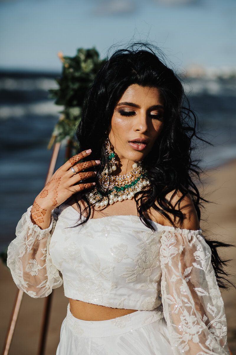  Beautiful bohemian bride styled in this Indian-fusion white dress for a bridal session on the shores of Lake Michigan. Midwest wedding photographer Kindred + Co Indian-fusion styled bridal session Northern Indiana wedding photographer Ogden Dunes Ch