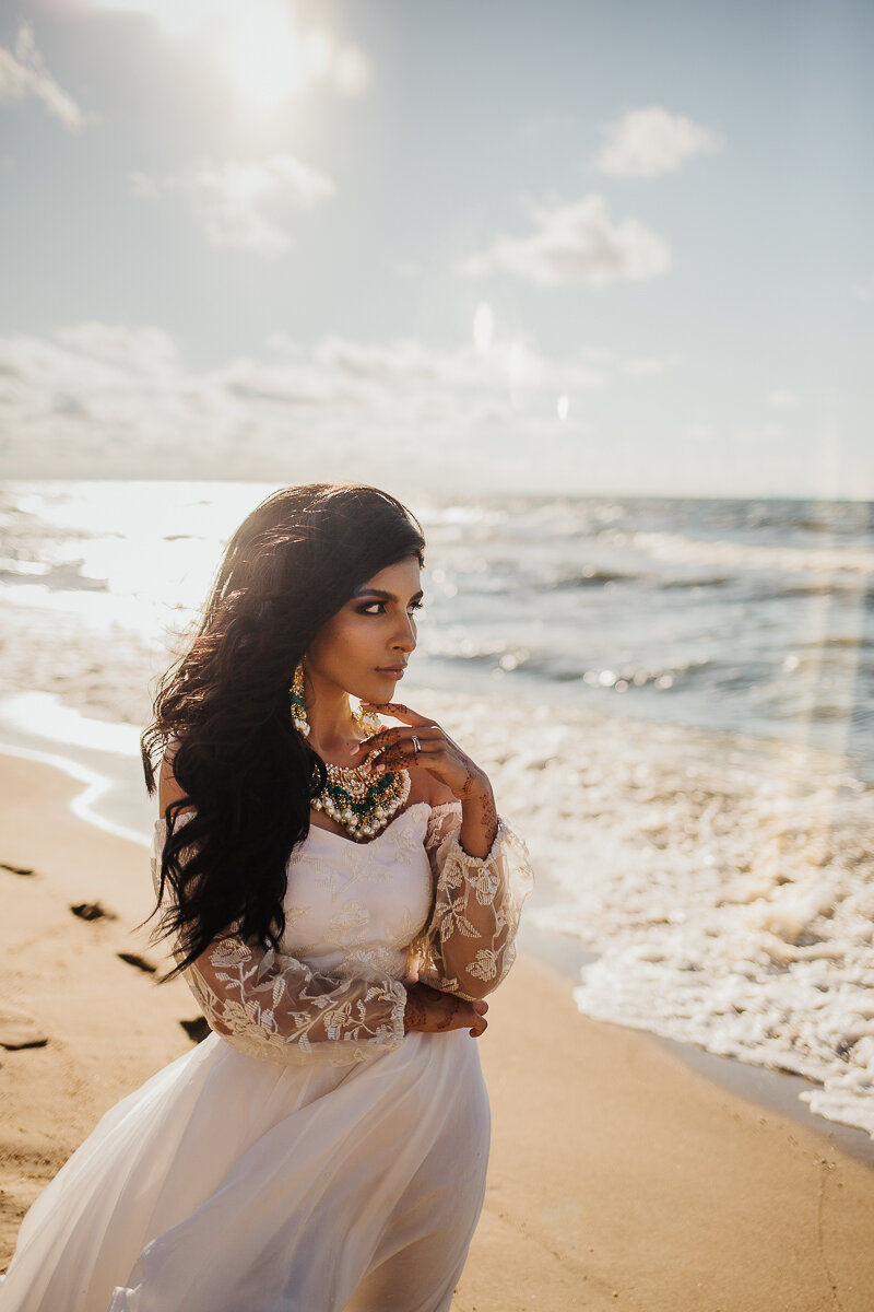  Stunning bride styled in an Indian-fusion white dress for this bridal session on the shores of Lake Michigan. Midwest wedding photographer Kindred + Co Indian-fusion styled bridal session Northern Indiana wedding photographer Ogden Dunes Chesterton 