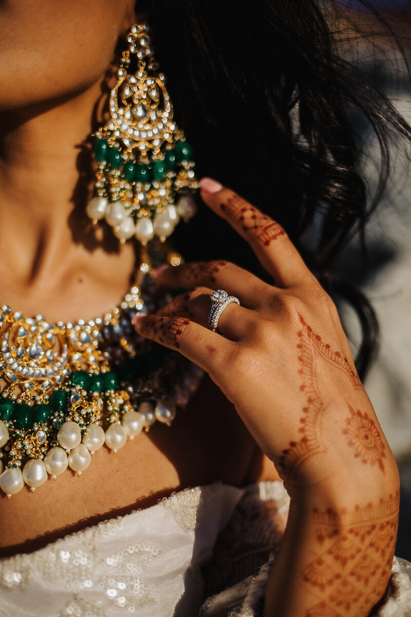  Stunning henna tattoo and bold jewelry for this boho bride on the shores of Lake Michigan for this bridal session. Midwest wedding photographer Kindred + Co Indian-fusion styled bridal session Northern Indiana wedding photographer Ogden Dunes Cheste