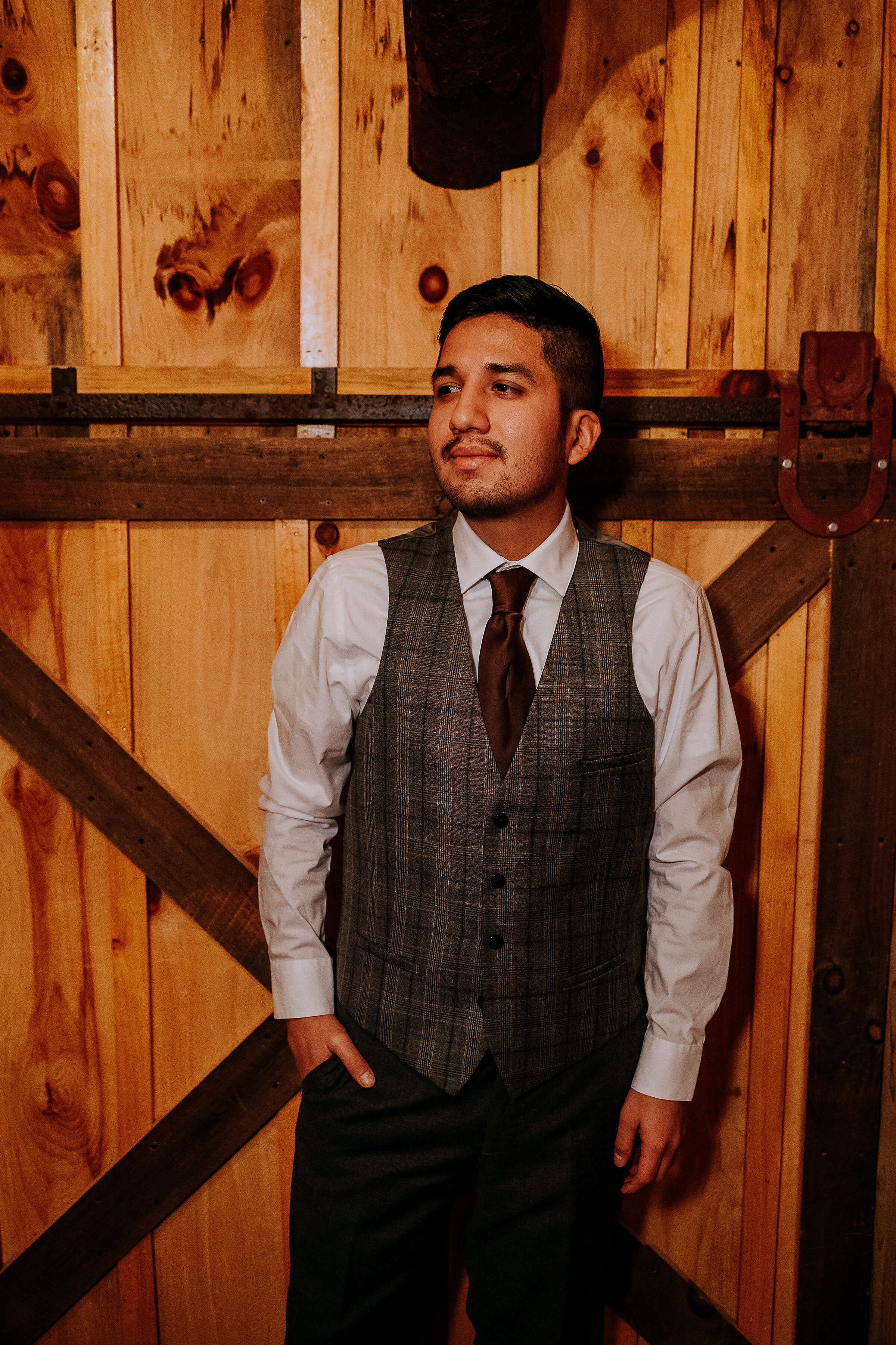  Kindred + Co. Photography captures groom on wedding morning before treehouse elopment in Columbus, Ohio. Gray plaid wedding vest and pants, maroon wedding tie, treehouse wedding, elopement photographer, wedding morning, professional midwest wedding 