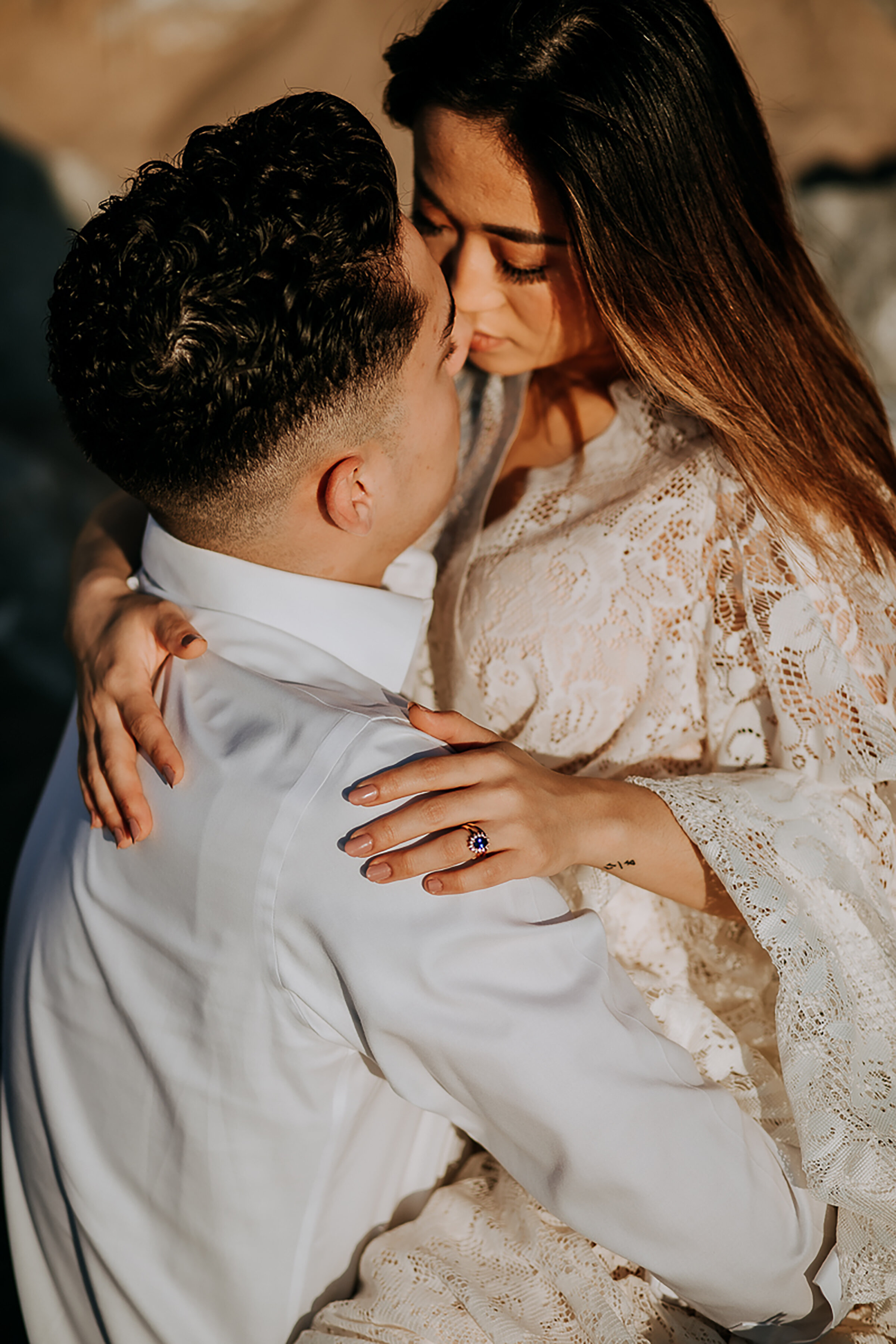  Newly eloped and in love, Kindred &amp; Co. Photography captures a romantic brace for this couple in Chesterton, Indiana. long nude colored wedding nails, blue diamond engagement ring, casual bell sleeved bohemian elopement dress, professional chest