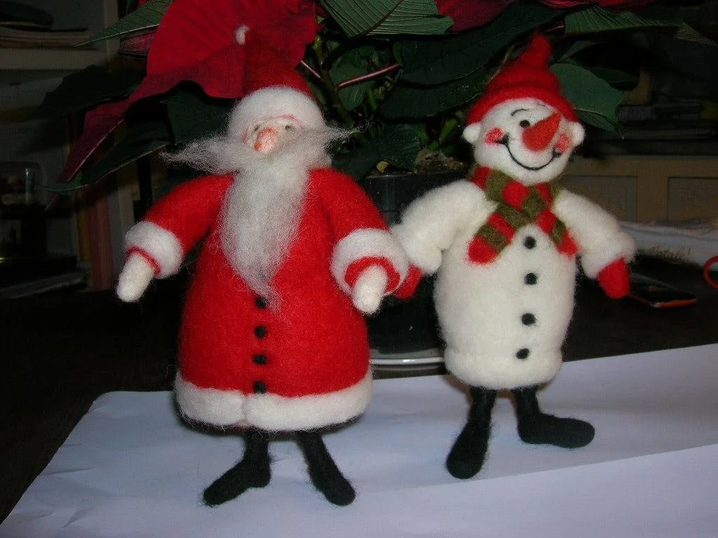 Pupazzo di neve e babbo Natale.jpeg