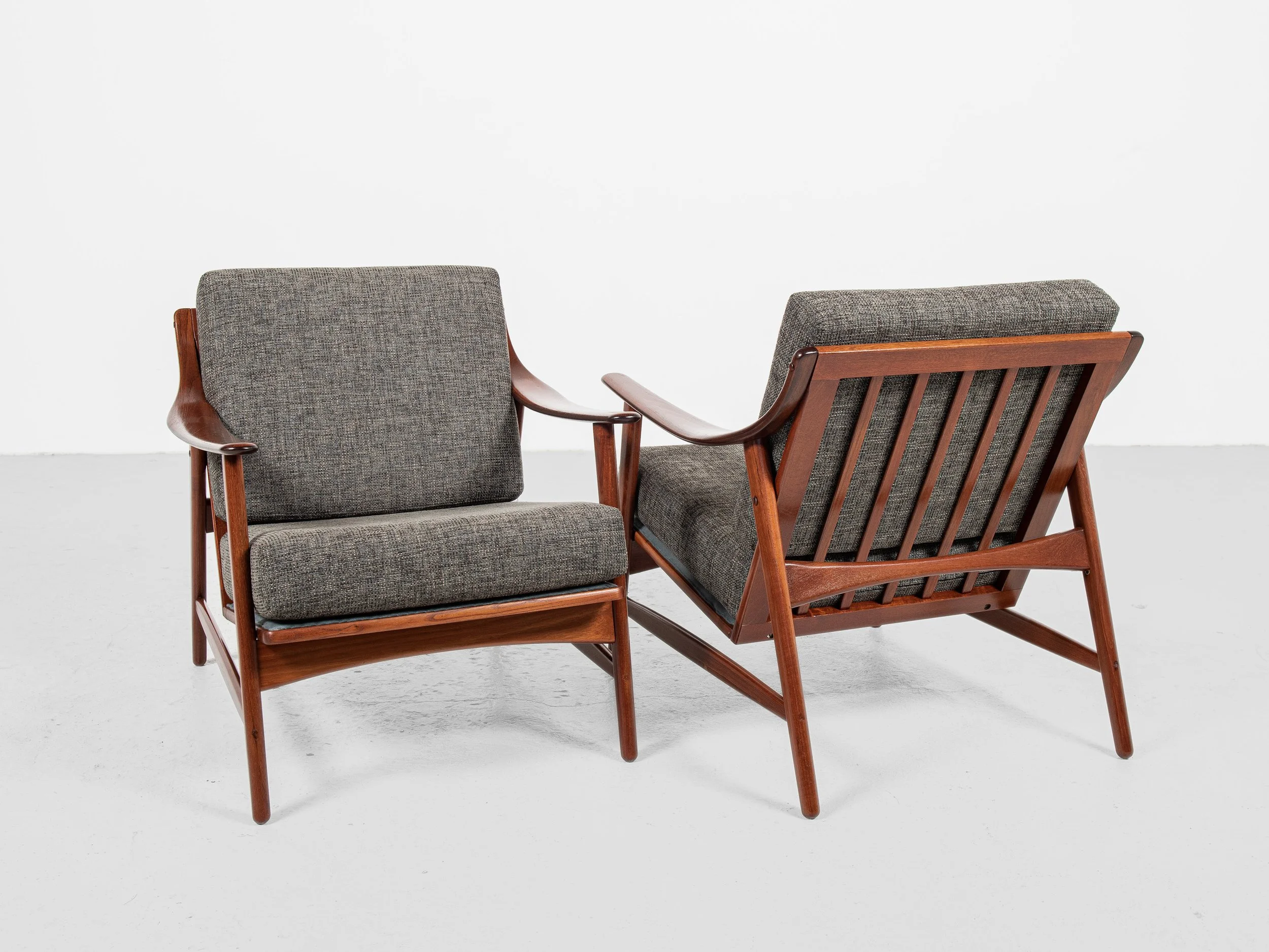 Midcentury Danish pair of easy chairs in teak by Arne Hovmand 