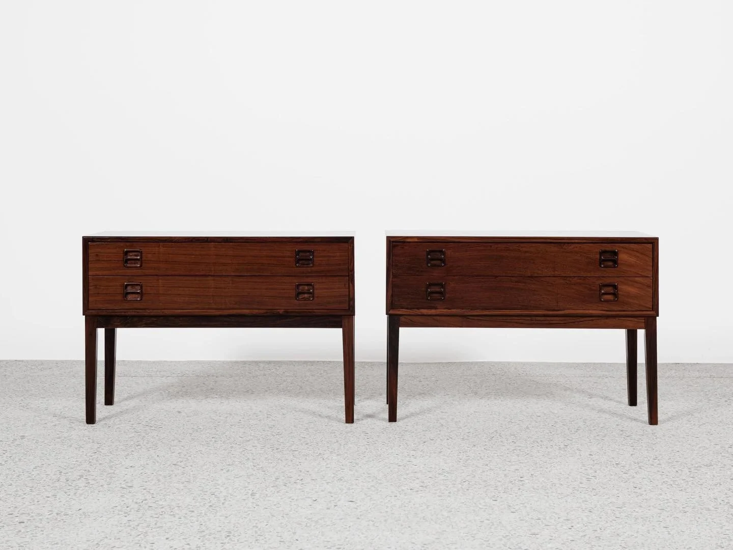 Midcentury Danish pair of chests in rosewood 1960s

This pair of night stands is made in Denmark in the 1960s. We don&rsquo;t know the manufacturer, but the chests show good quality materials and manufacturing methods. The design of the legs and draw