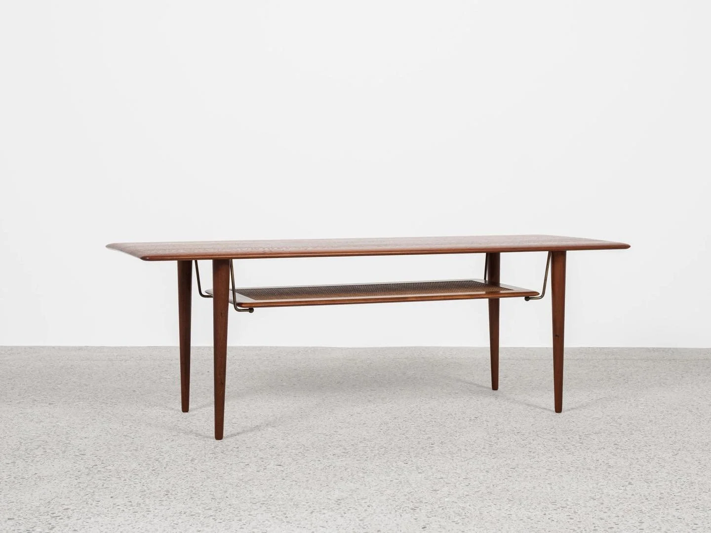 Midcentury Danish rectangular Coffee Table in Teak by Peter Hvidt &amp; Orla M&oslash;lgaard-Nielsen for France &amp; S&oslash;n 1960s

This rectangular coffee table with 2 levels is designed by Peter Hvidt &amp; Orla M&oslash;lgaard-Nielsen and manu