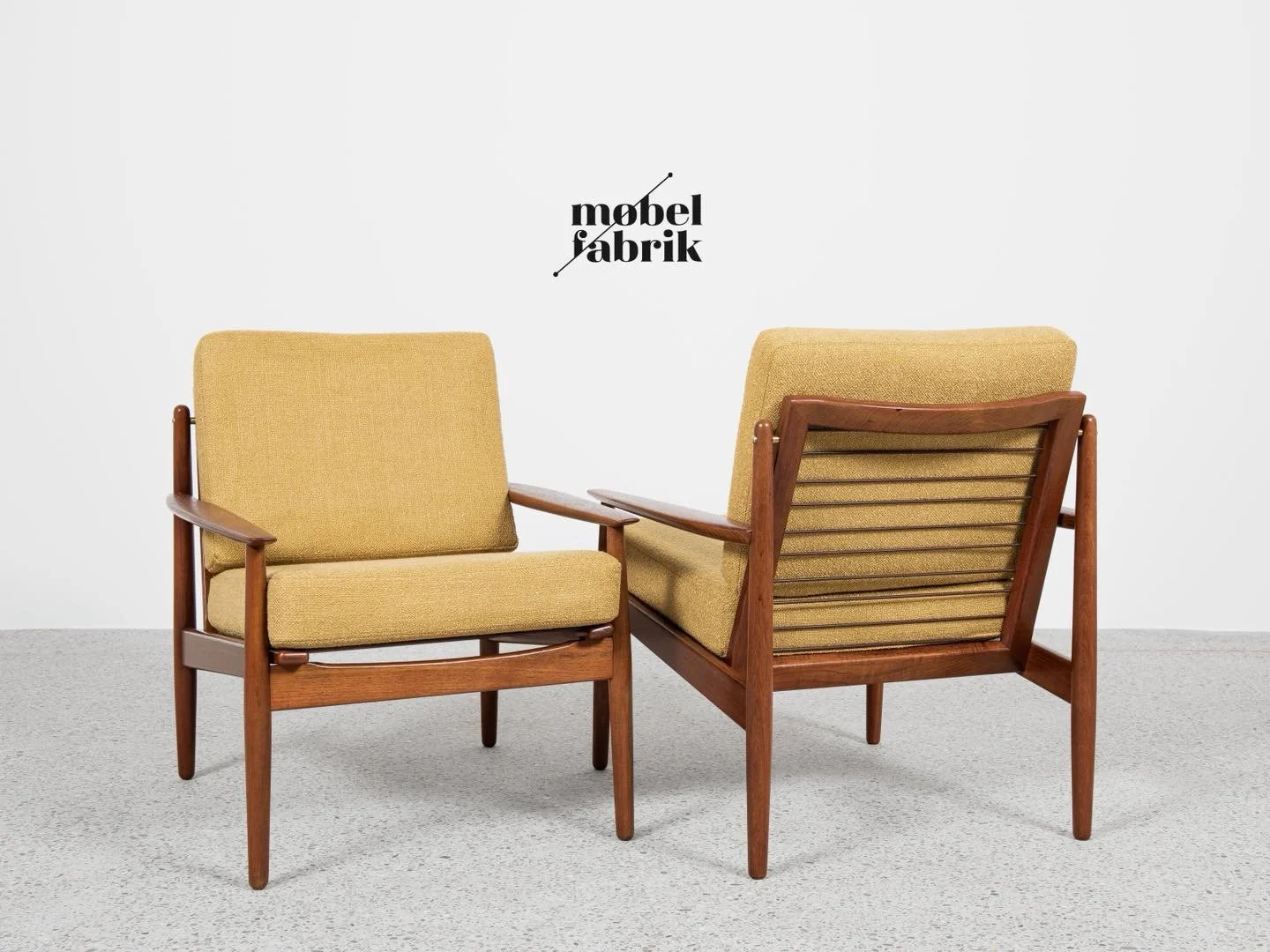 Midcentury Danish pair of easy chairs in teak by Arne Vodder for Glostrup 1960s

This pair of easy chairs is designed by Arne Vodder and manufactured by Glostrup in Denmark in the 1960s. There is an old label by the manufacturer. The design stands ou