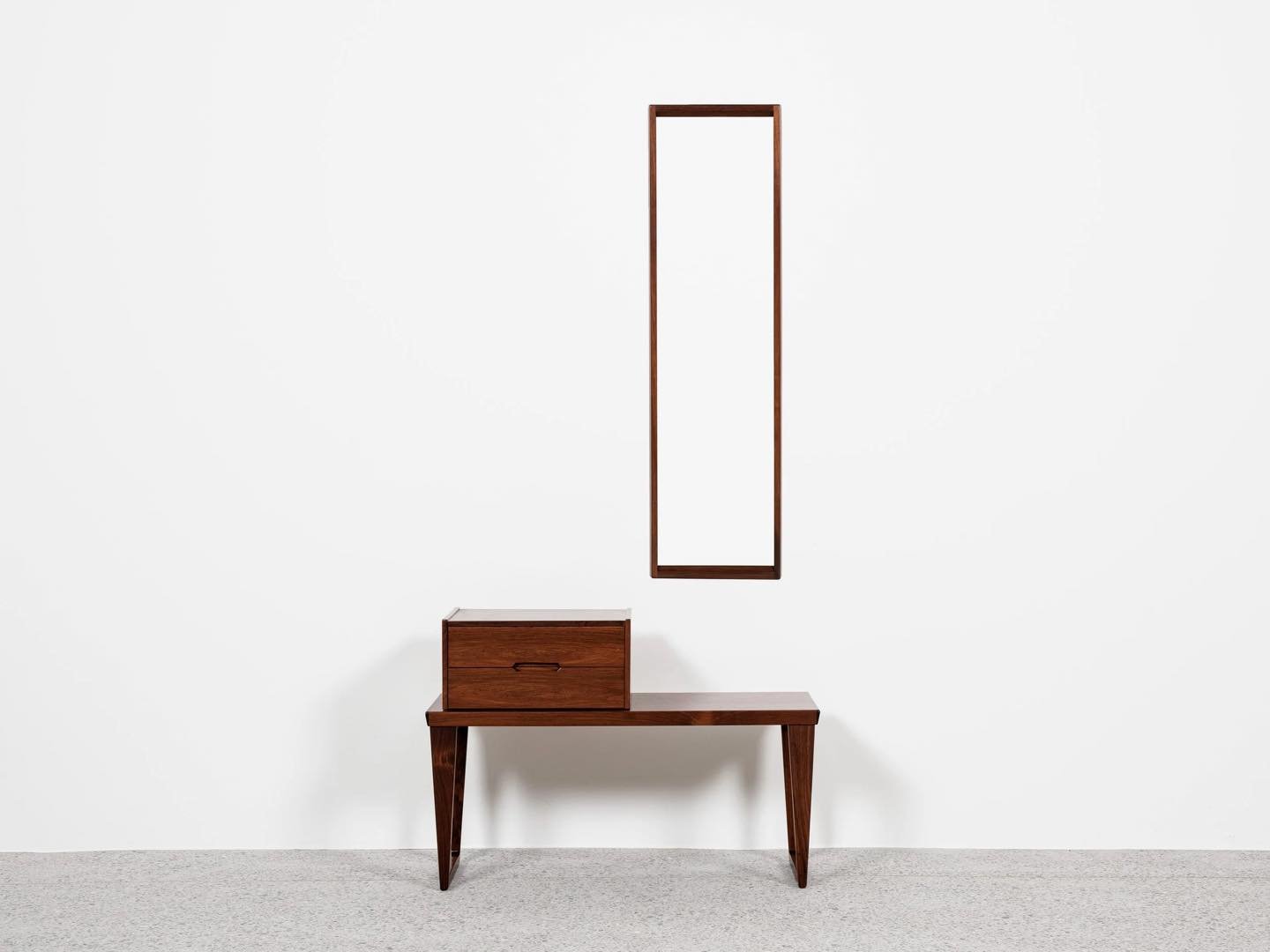 Midcentury Danish set of mirror, bench and container in rosewood by Aksel Kjersgaard 1960s

This original set of mirror, bench and container is designed by Kai Kristiansen and manufactured by Aksel Kjersgaard in Denmark in the 1960s. This is a top se