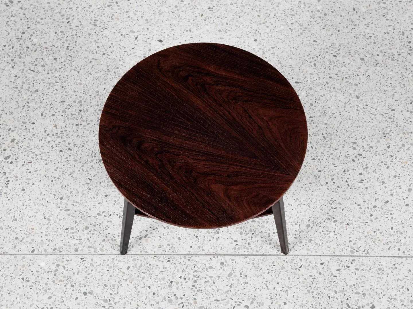 Midcentury Danish round side table in rosewood by Holger Georg Jensen for Kubus 1960s

This round side table is designed by Holger Georg Jensen and manufactured by Kubus in Denmark in the 1960s. It is a known model. The drawings in the wood are very 