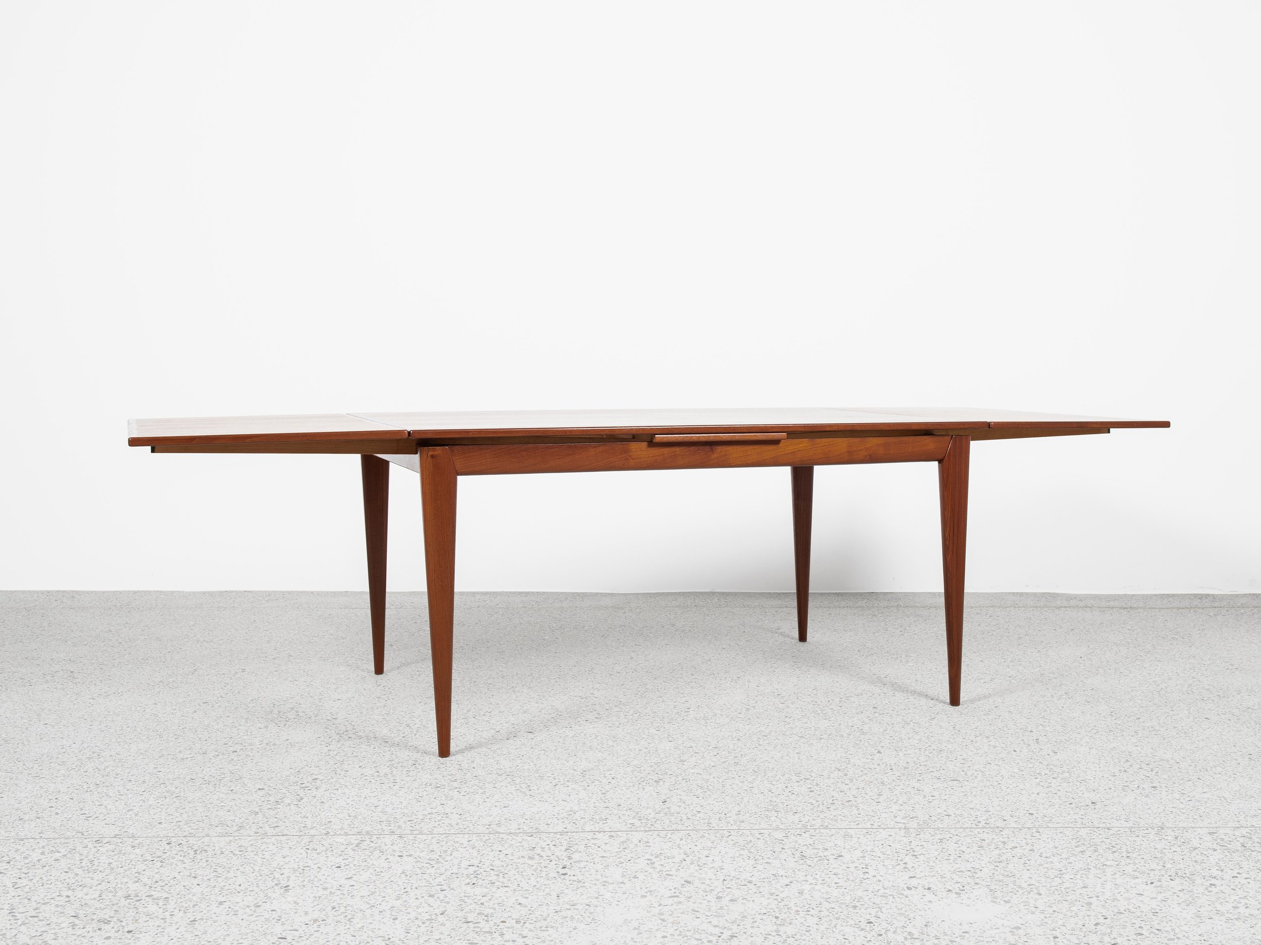 Midcentury wider Danish dining table in teak by Niels Otto Møller