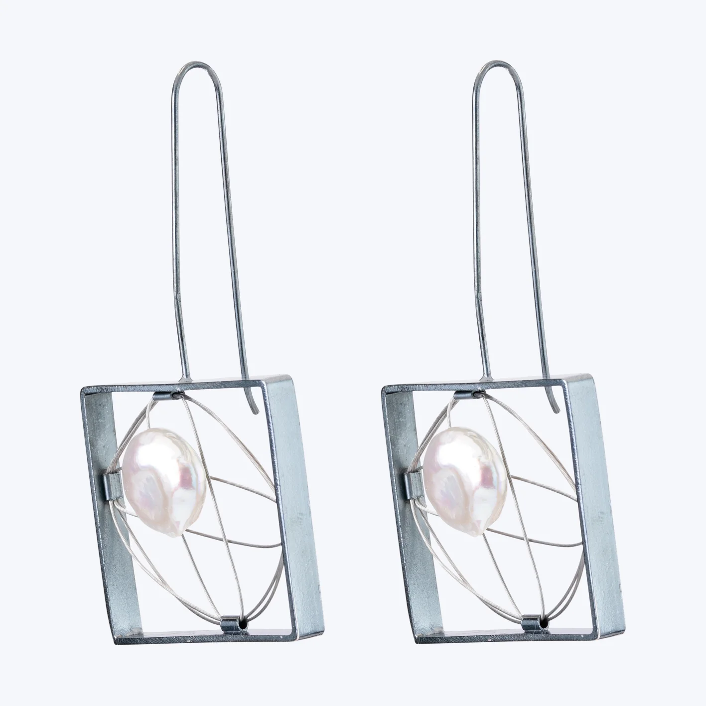 Handmade oxidized silver earrings with square frame body