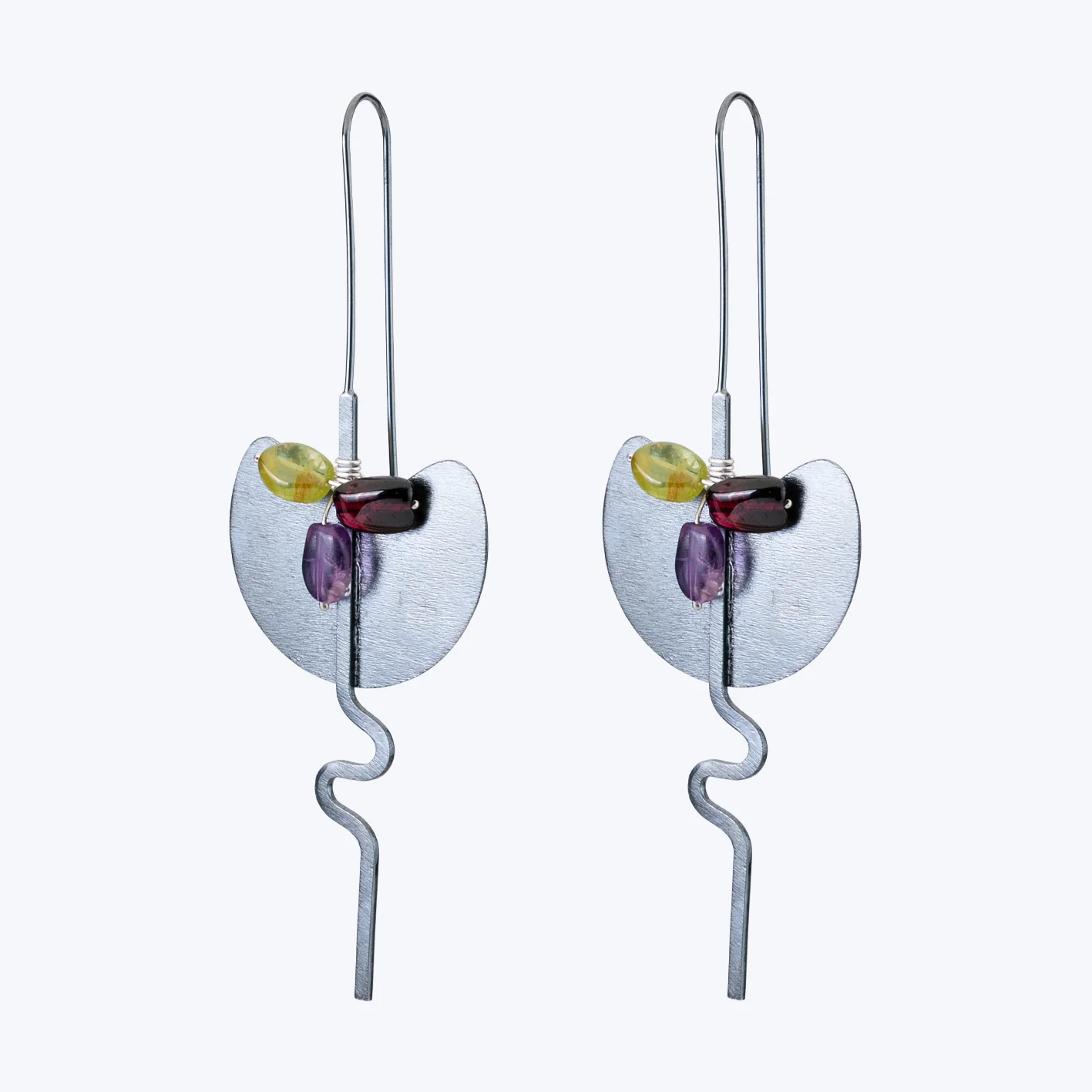 Handmade, oxidized silver earrings coiled with natural stones