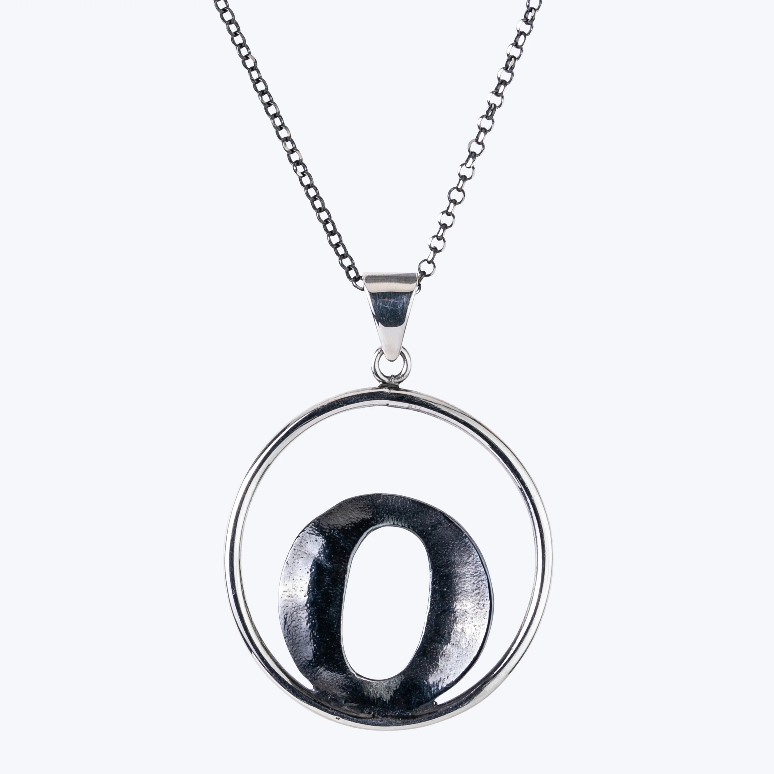 Plain and oxidized silver double circle sterling silver pendant