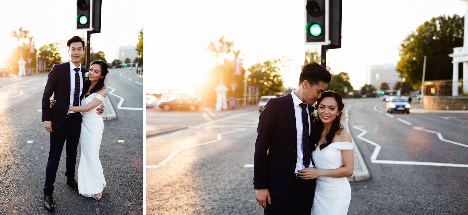 Wedding couple embrace near traffic lights on Southampton's waterfront