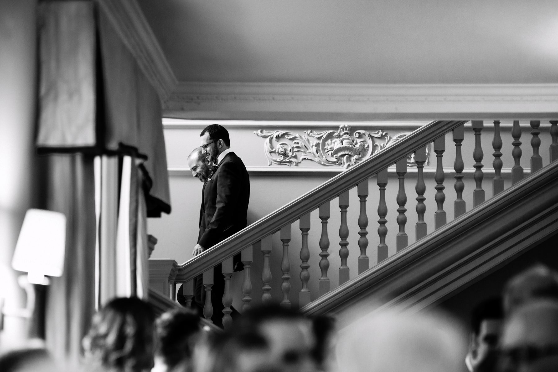 Two grooms make their way to their wedding ceremony at Morden Hall