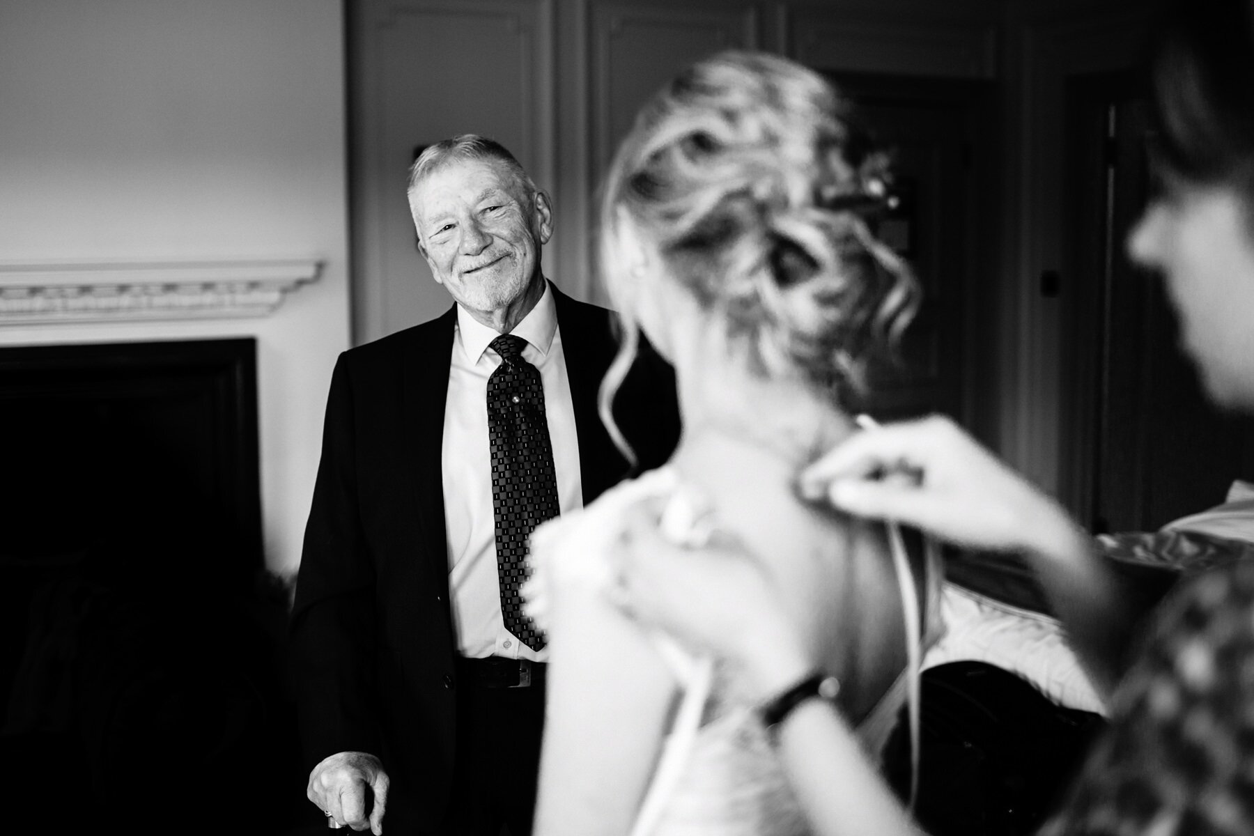 Father of the bride looking proudly at his daughter on her wedding day at Horsley Towers.