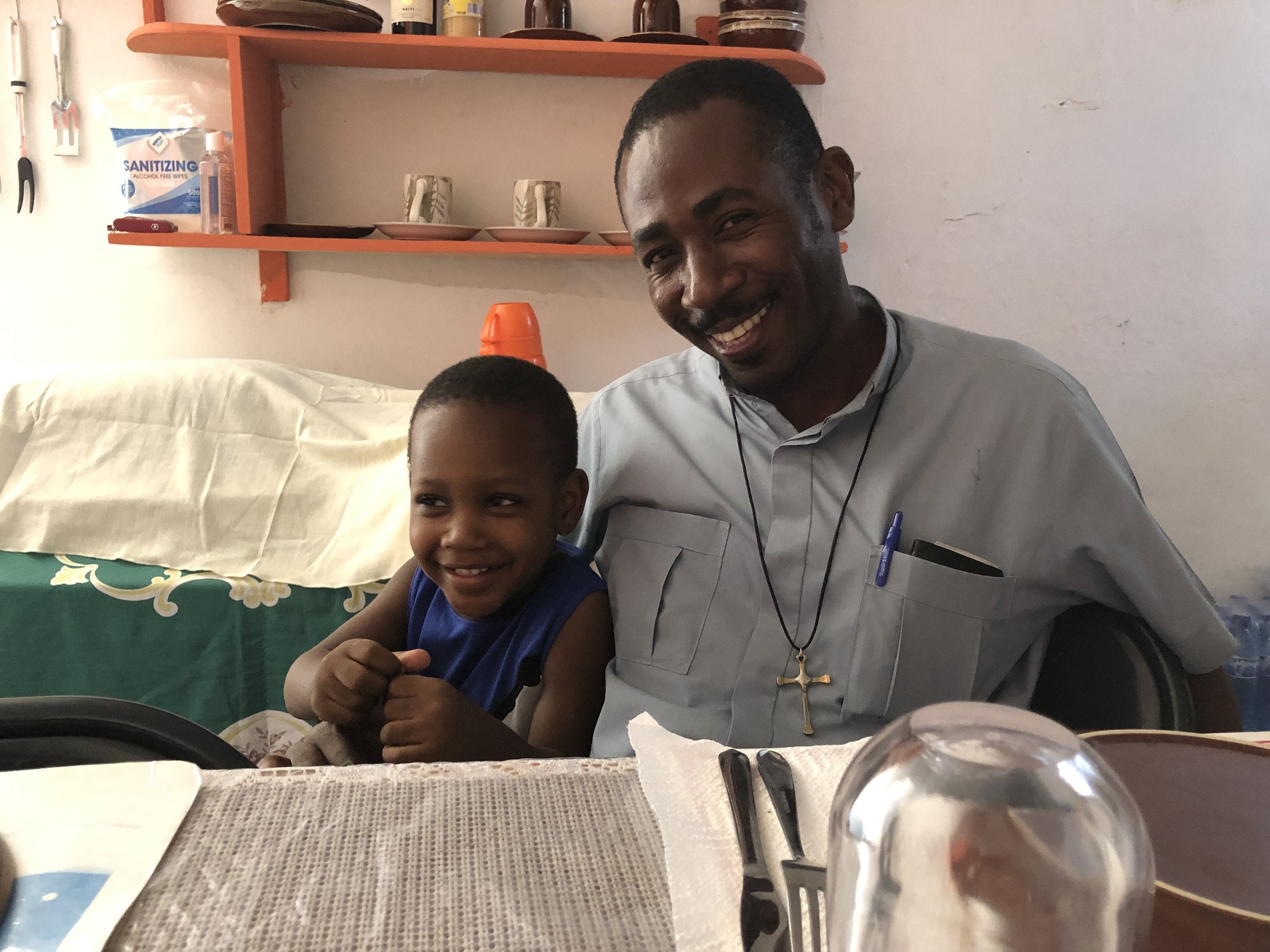 Father Goursse with son smiling.JPG