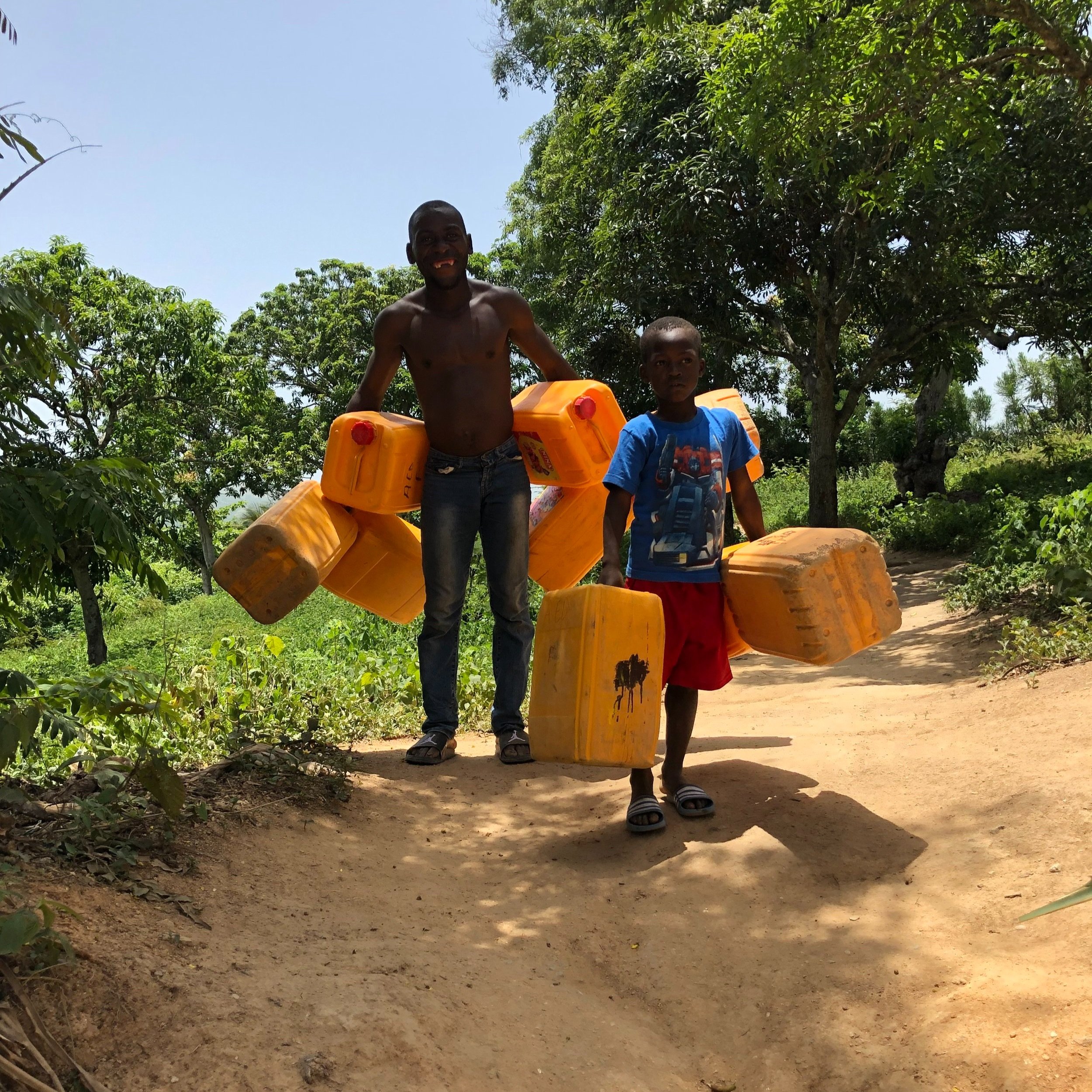 children+with+empty+water+containers+-+Haiti.jpg