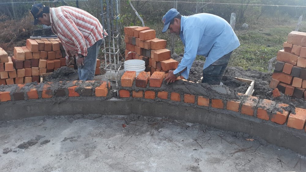 laying brick walls - beginning process.jpeg