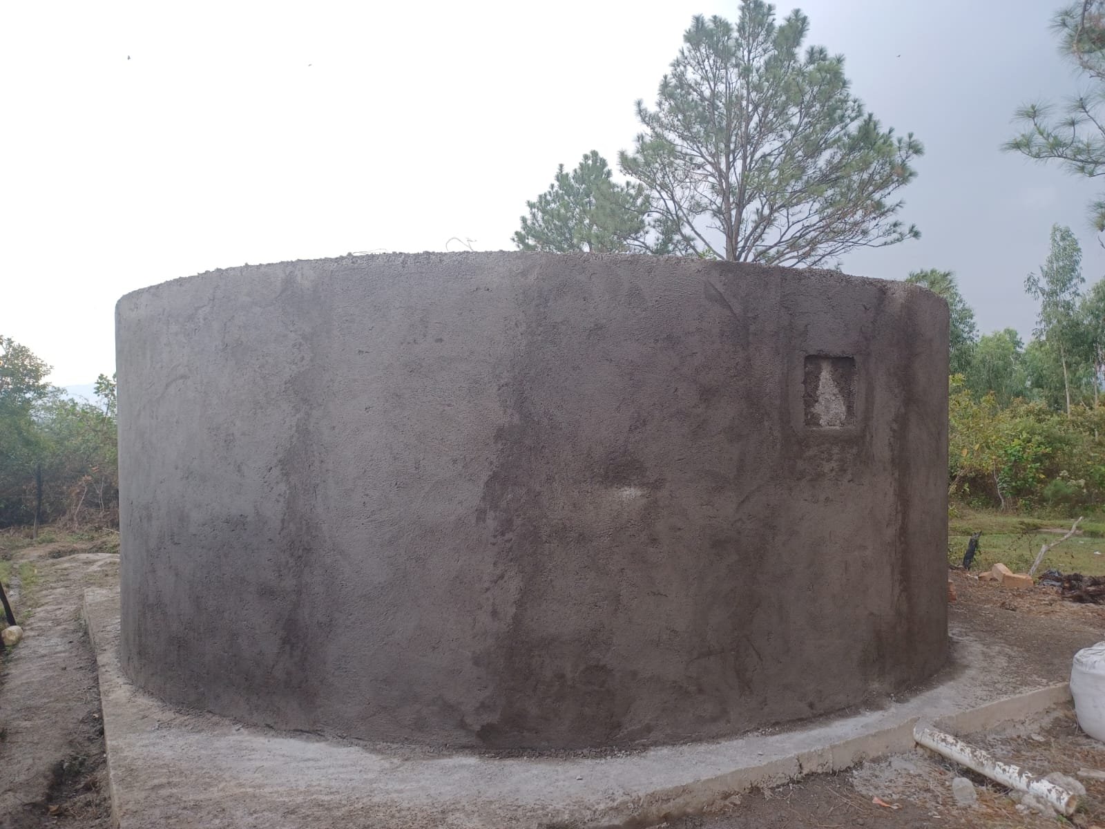 view of tank from side with walls complete.jpeg