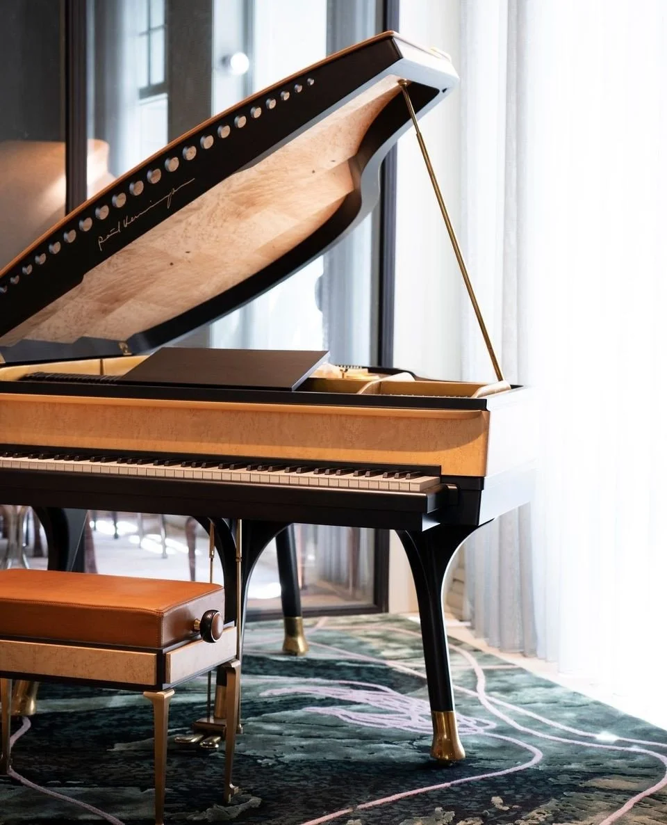 Where Danish design meets bespoke artistry: the PH Bow Grand Piano, a one-of-a-kind jewel of 1937 design by Poul Henningsen, rests gracefully upon a Tai Ping carpet - a masterwork woven with heritage and luxury. Pure craftsmanship in harmony.