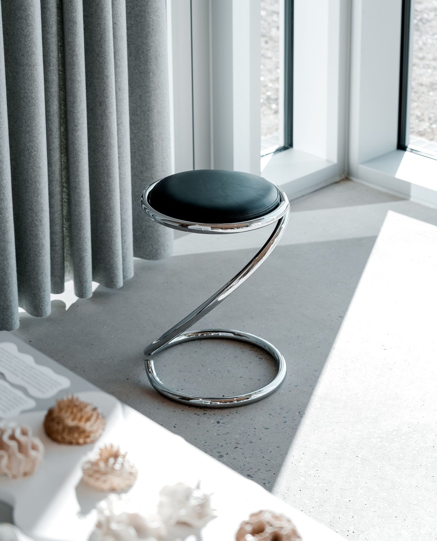 The PH Snake Stool is a striking expression of Poul Henningsen&rsquo;s experimental approach to furniture design. Designed in 1932, both the PH Snake Chair and the PH Snake Stool challenge conventional ideas of seating through their sculptural, count