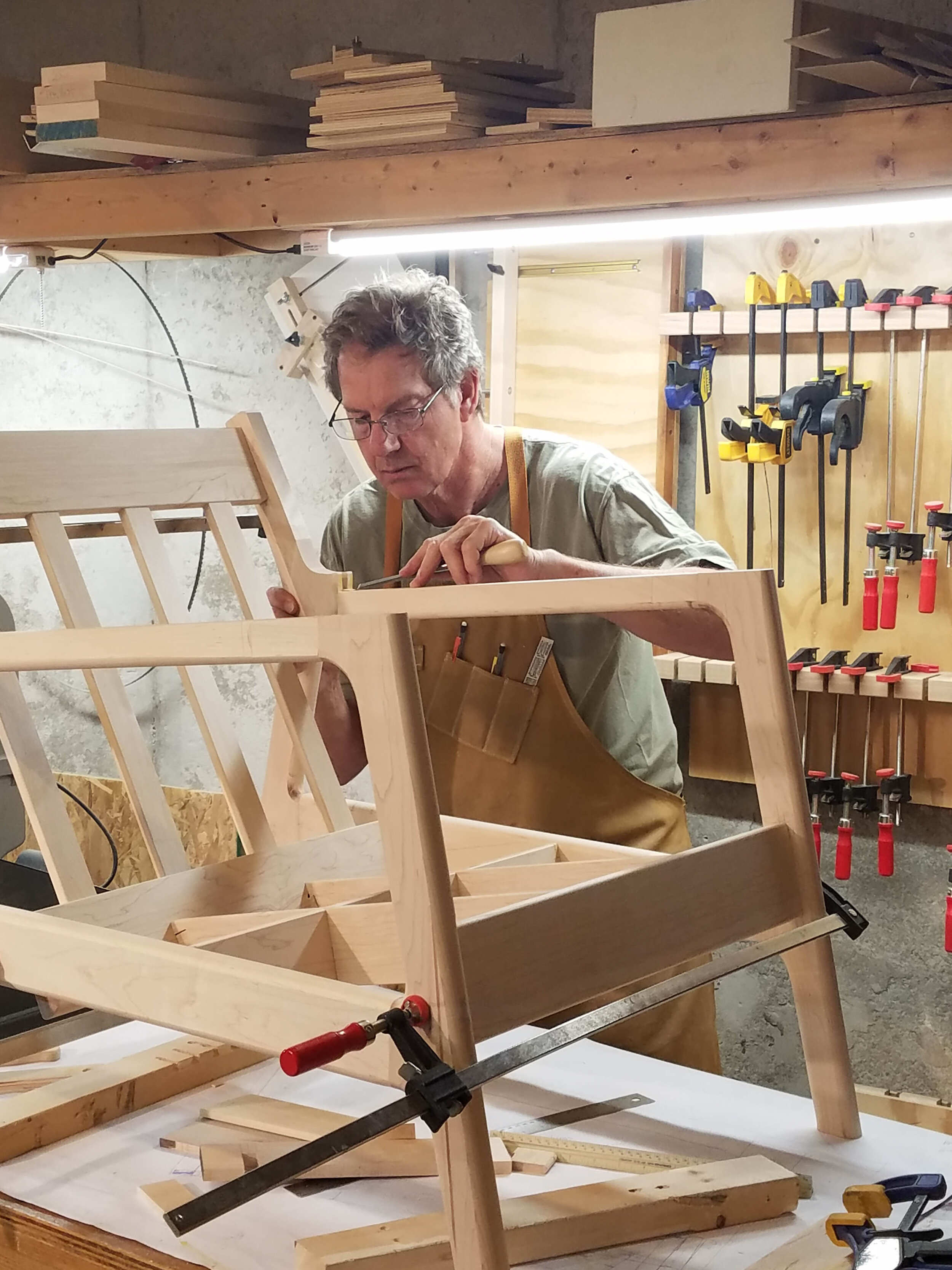 Howard Haas working on a chair