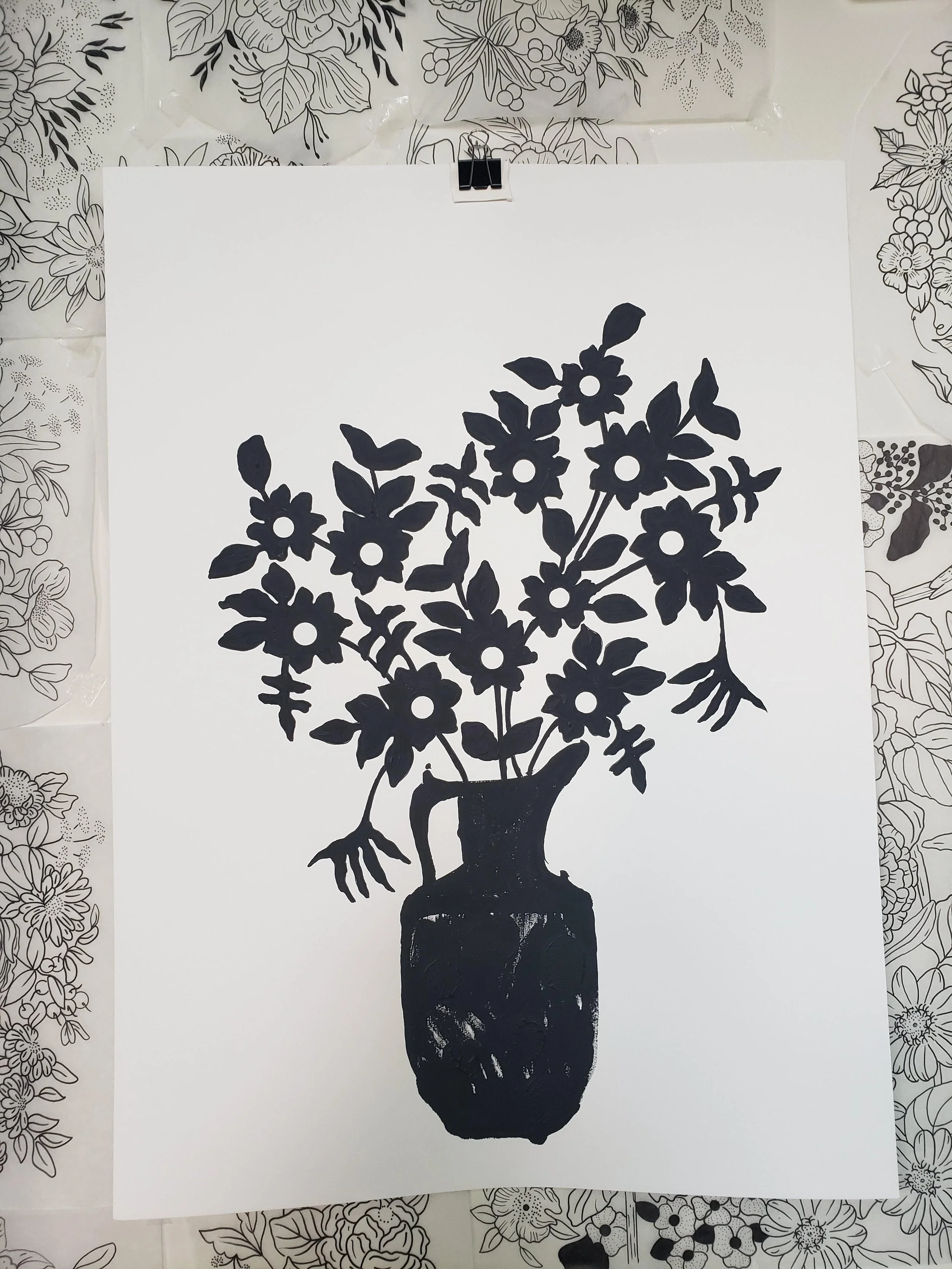 widowbird blooms in a black jug