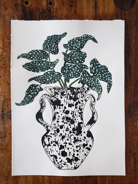 leafy begonia in a splatter vase